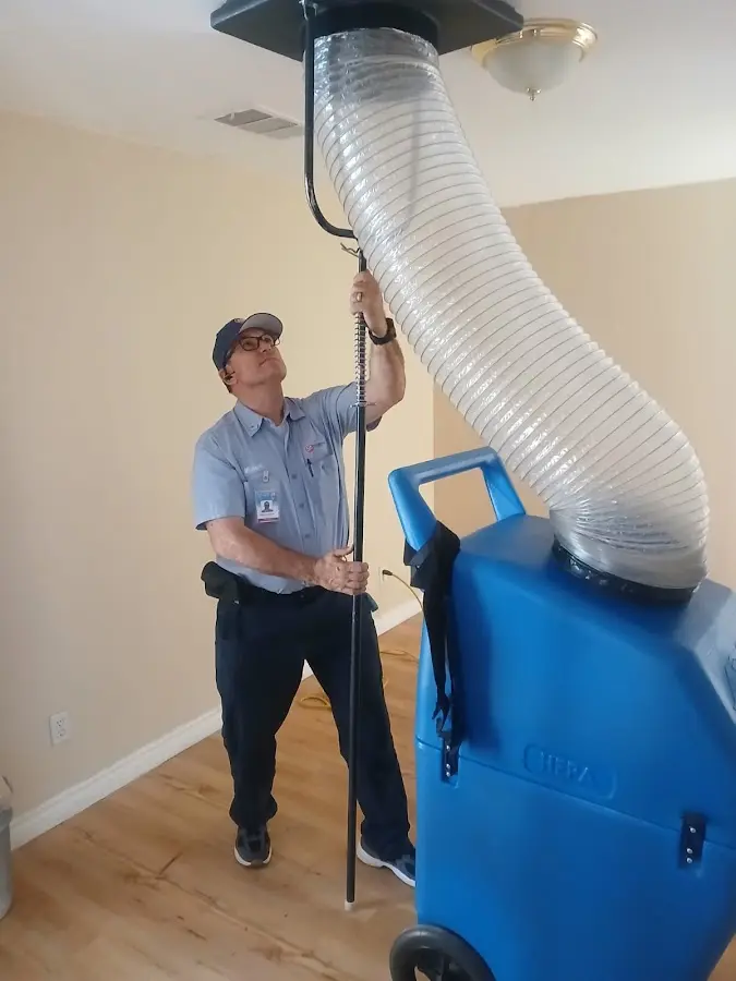 Mini Split Installation technician using HEPA equipment in Conneaut